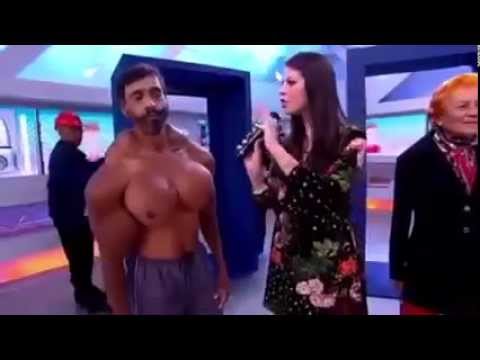 شاهد رجل يحاول تضخيم عضلاته